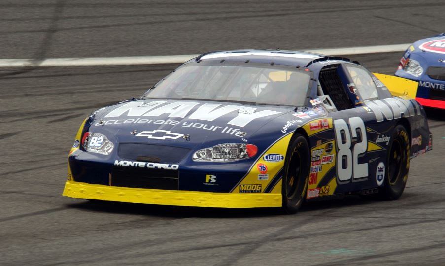 number 82 navy blue car on the race track