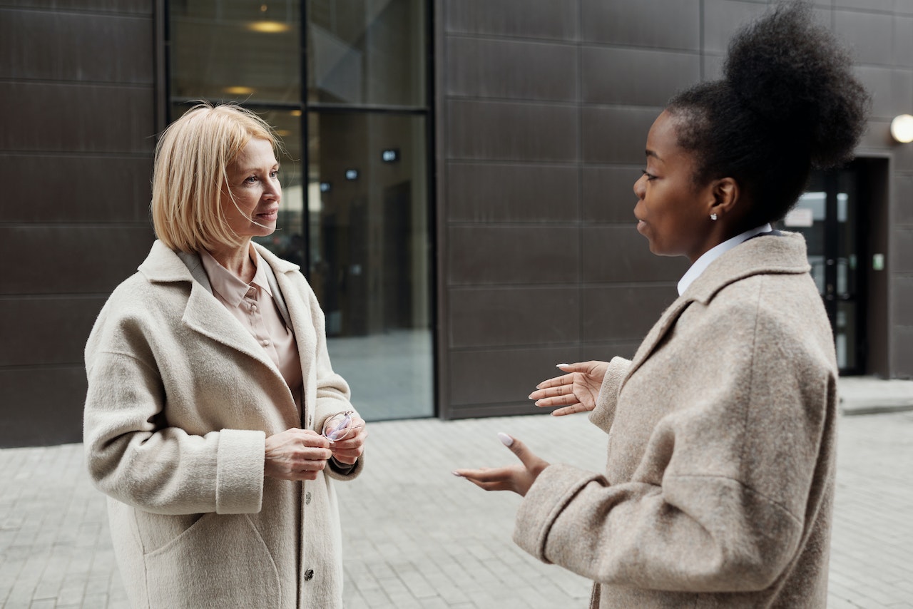 a woman talking outside