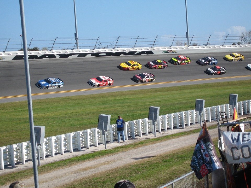 stock cars racing on Daytona track