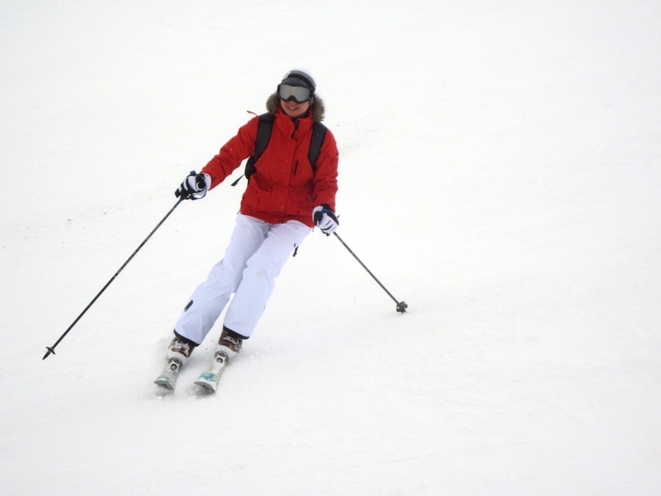 female skier, ski equipment, downhill slope, snow