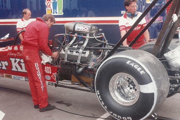 Armstrong (left) working on Kenny Bernstein's car.