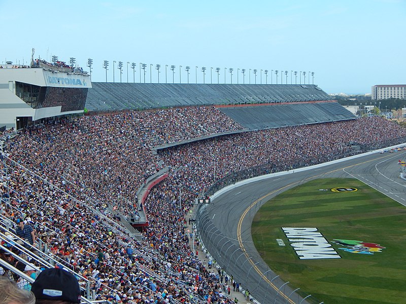 the tri-oval during the 2015 Daytona 500 with nearly completed grandstand in the background