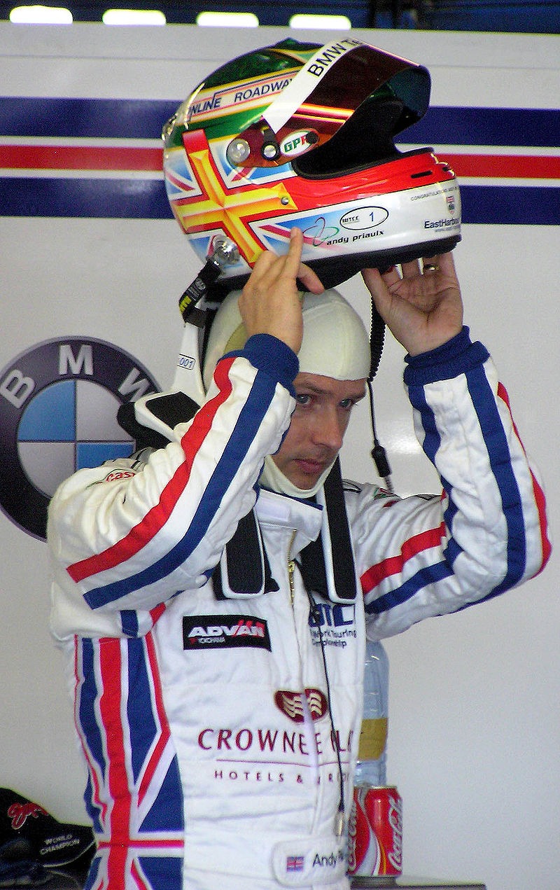 A race car driver with a HANS device