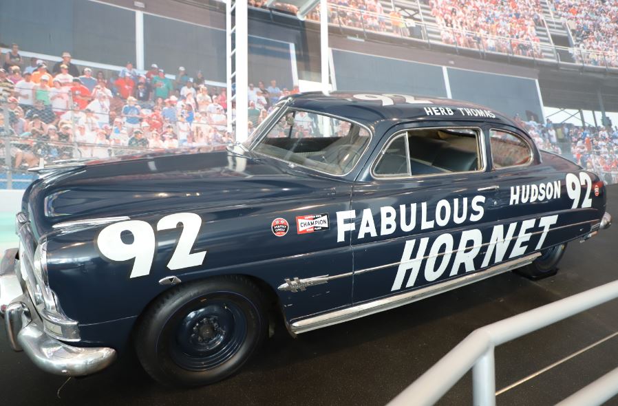 dark blue Hudson Hornet with number 92 placed on the car