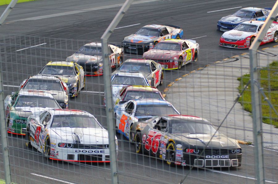 multiple NASCAR cars on the race track