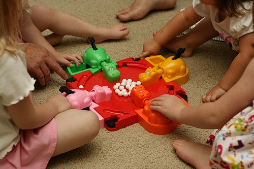 Hungry hippos being played by four children